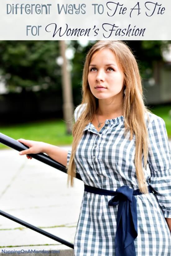 Woman in checkered dress with tied blue band